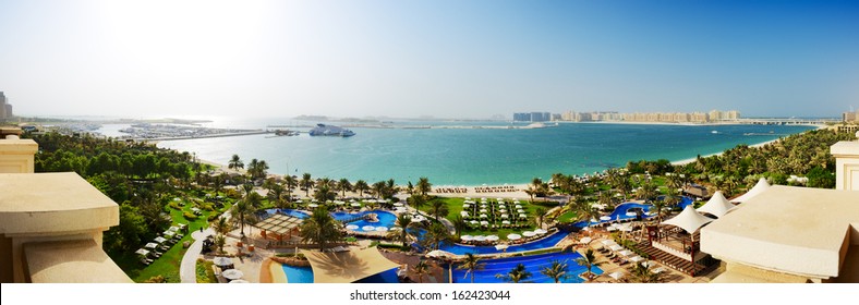 Panorama of beach with a view on Jumeirah Palm man-made island, Dubai, UAE