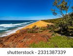 panorama of beautiful long beach with orange sand in deepwater national park south from agnes water and seventeen seventy; unique coast of gladstone region in queensland, australia;	