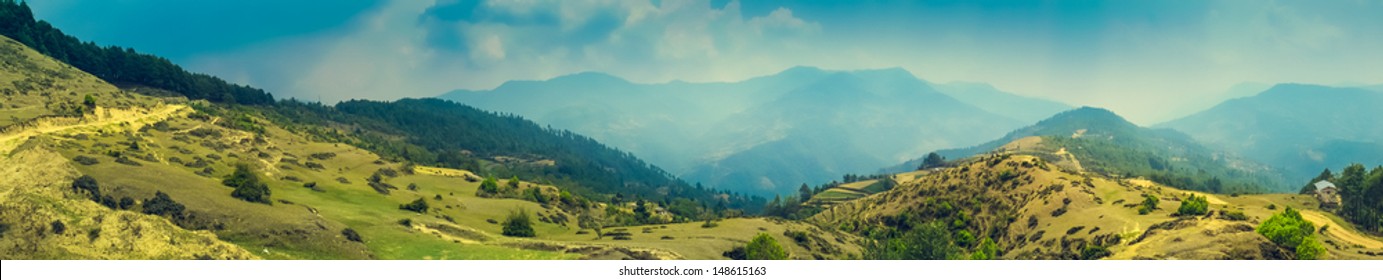 Panorama of Beautiful Mountain Valley with Sunlight - Shutterstock ID 148615163