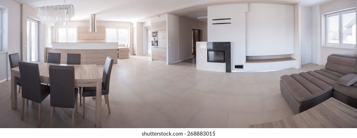 Panorama of beige elegant detached house interior