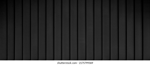 Panorama of Black Corrugated metal background and texture surface or galvanized steel. Wood plank black timber texture. seamless background.