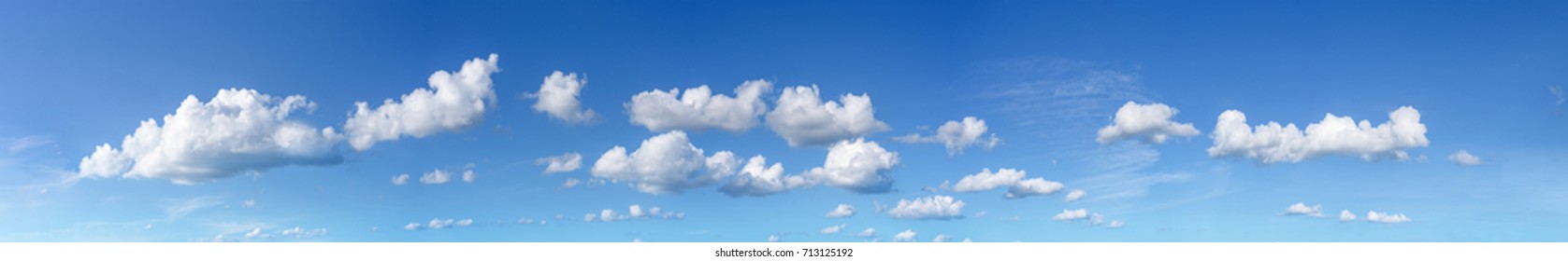 Panorama Of A Blue Sky With Clouds And Sun