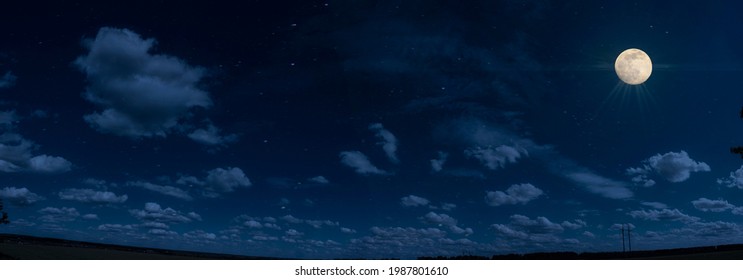 Panorama of blue sky with white fluffy clouds - Powered by Shutterstock