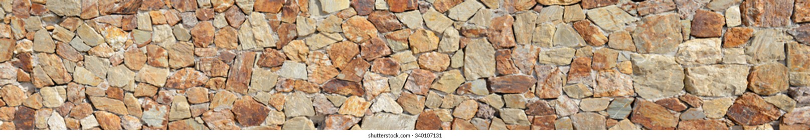 Panorama of Brown Stone Wall Background and Texture Photo