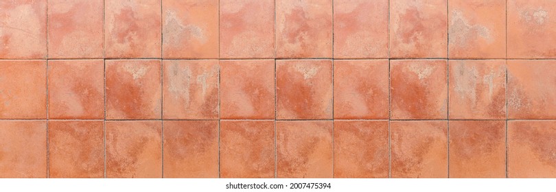 Panorama of brown terra cotta floor tiles outside the building pattern and background seamless - Shutterstock ID 2007475394