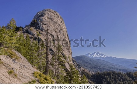 Panorama of Castle Crags State Park's Castle Dome During the Day with Mount Shasta in the Back Ground