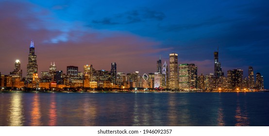 Panorama of Chicago Cityscape river side along Lake Michigan at beautiful twilight time, Illinois, United States, building and real estate,Business Architecture and building,travel and tourist concept - Shutterstock ID 1946092357