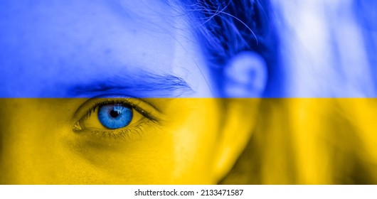 Panorama Children's eyes full of sadness in Ukraine colors