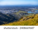 panorama of christchurch city as seen from the gondola summit, bridle path with scenic view of the city, canterbury, new zealand south island