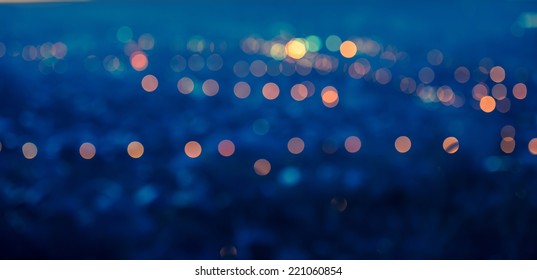 Panorama City Blurring Lights Abstract Circular Bokeh Blue Background With Twilight Horizon