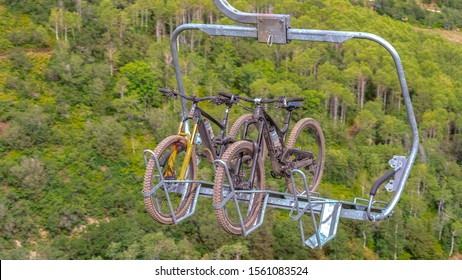 Panorama Close Up Of Chairlifts With Mountain Bikes In Park City Ski Resort At Off Season