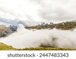 Panorama of cloud layer from mountain top over Swiss alps
