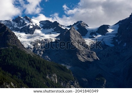 Panorama of a colored mountain landscape in South Tyrol, Italy with the snow covered mountains. High quality photo