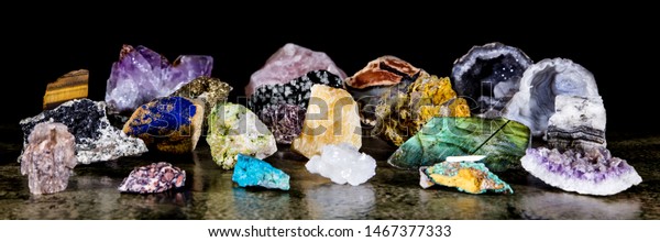 Panorama, colorful various uncut and raw\
mineral stones, gemstone and healing stone\
collection