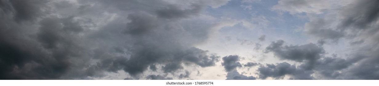 Panorama Of Dark Gray Stormy Sky, Gray Clouds Cover The Sky