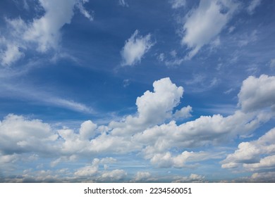 Panorama of daytime sky with clouds. Sky background, daylight sky with lighted clouds. Beauty clouds over sea - Shutterstock ID 2234560051