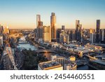 Panorama of downtown Melbourne from high point. Australia. Drone photo of skyscrapers before sunset