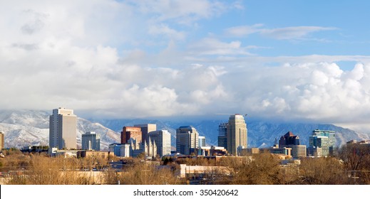 Panorama Of Downtown Salt Lake City In The Winter With Low Clouds And Mountains In The Background, Utah, USA