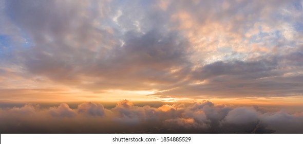 Panorama of Dramatic vibrant color with beautiful cloud of sunrise and sunset. Panoramic image