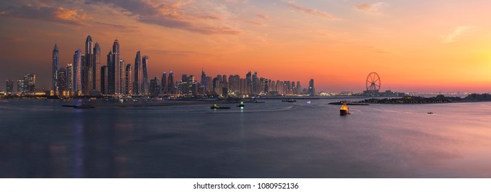 Panorama of Dubai Marina skyline at sunset
