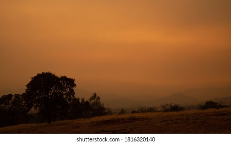 Panorama Of Eerie Smoke Filled Sky Over The Sierra Foothills Grasslands 