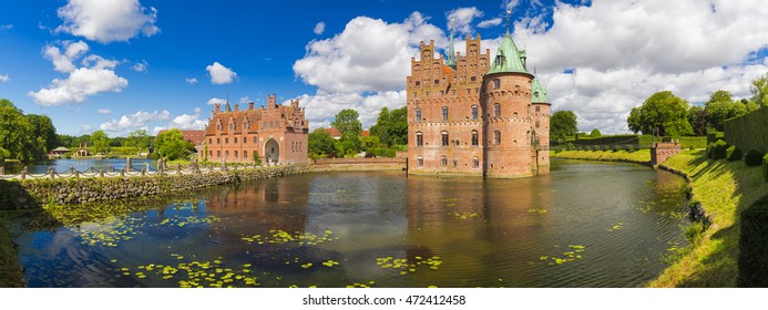 Panorama Of Egeskov Castle, Located In The South Of The Island Of Funen, Denmark.