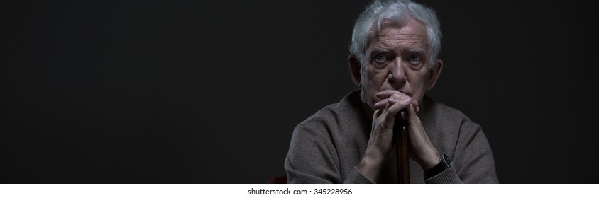 Panorama Of Elder Depressed Man With Worried Facial Expression