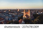 Panorama of evening Munich at sunset, view of the Isar River, and Kath. Pfarramt St. Maximilian