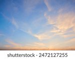 Panorama of evening sky with clouds. sunset Sky background, Sunrise sky with lighted clouds. Beauty evening sunrise over sea