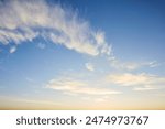 Panorama of evening sky with clouds. sunset Sky background, Sunrise sky with lighted clouds. Beauty evening sunrise over sea