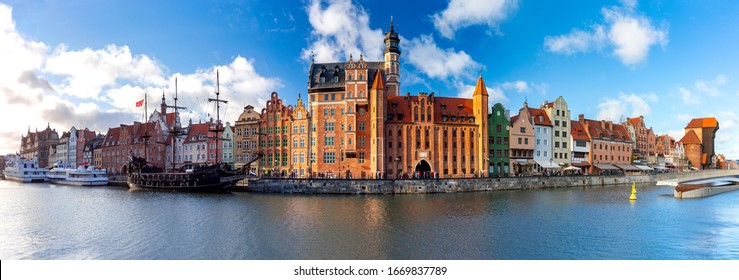 Panorama of the facades of old medieval houses on the promenade in Gdansk. Poland.