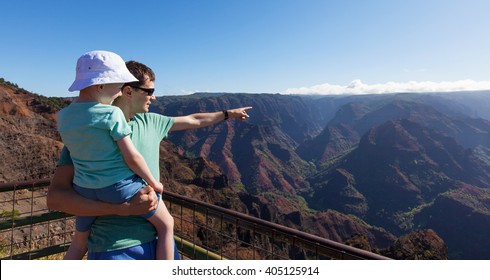 Panorama Of Family Enjoying Waimea Canyon At Kauai Island, Hawaii, From The Viewpoint