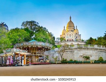 Panorama Of The Famous Basilica Of Sacre-Coeur In Montmartre, Paris At Sunset With Carousel Horse Ride, No People