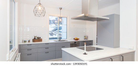 Panorama Of Fancy Kitchen With Grey Cupboards