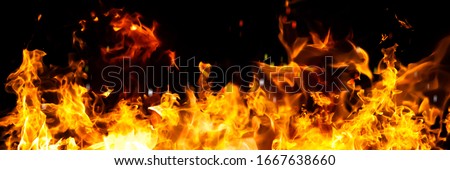 Panorama Fire flames on black background. fire burst texture for banner backdrop.