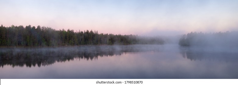 Panorama Of A Forest Lake With Morning Fog Above The Water