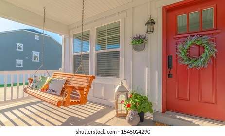 Panorama Frame Front Porch Of Alternative Home And Swinging Chair