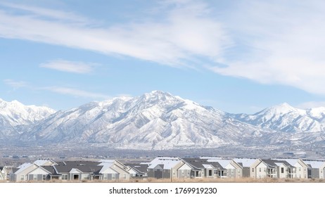 Panorama Frame Striking Wasatch Mountains And South Jordan City In Utah During Winter Season