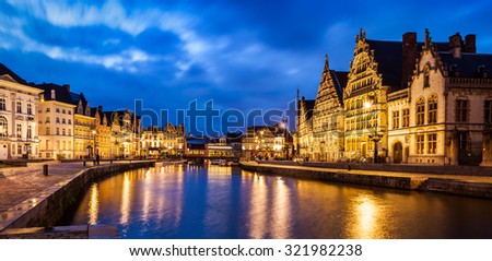 Panorama of Ghent canal, Graslei and Korenlei streets in twlight the evening. Ghent, Belgium
