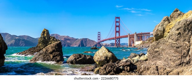 Panorama of  Golden Gate Bridge seen from Marshall beach in San Francisco, California, USA