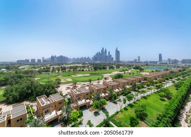 Panorama of the golf course with Dubai skyline on the background 