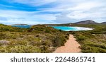 panorama of hellfire bay in cape le grand national park, a paradisiacal beach with white sand and turquoise water surrounded by mighty hills	