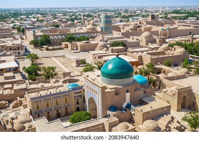 Panorama of historical center of Khiva (Uzbekistan) - Ichan-Kala (inner city). In foreground is mausoleum of Pahlavan Mahmoud. Background: Kalta Minor minaret, khan's palace and Muhammad Amin madrasah