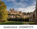 Panorama of the historical center, Orb river and the ancient stone bridge of the city of Beziers. Occitanie, Southern France.