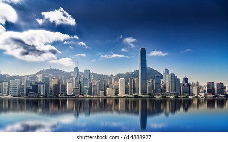 Panorama of Hong Kong island with reflections in the water 