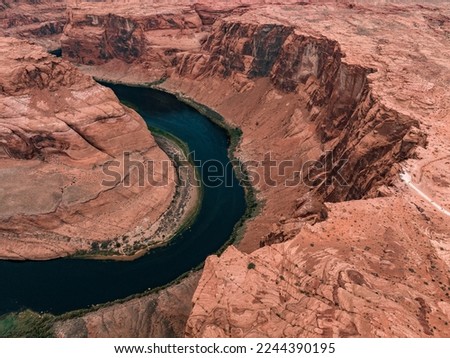 Panorama of Horseshoe Bend, Page Arizona. The Colorado River and a land mass made of orange sandstone. Made of twenty-three images, not one hundred percent accurate for perspective.