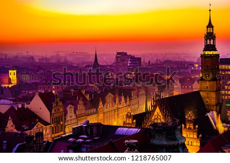 Panorama illuminated old town of Wroclaw at night. Popular travel destination in Poland. High dynamic range.