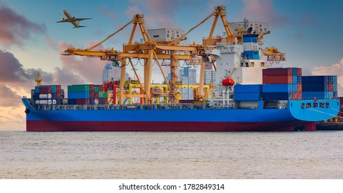 Panorama image of container cargo ship with ports crane bridge at harbor and airplane in sunrise sky. logistics and transportation concept