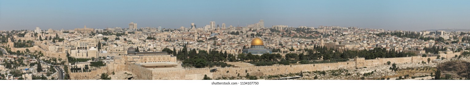 Panorama of Jerusalem Old City with gold Dome of the Rock Islamic shrine in the middle and other famous buildings and landmarks