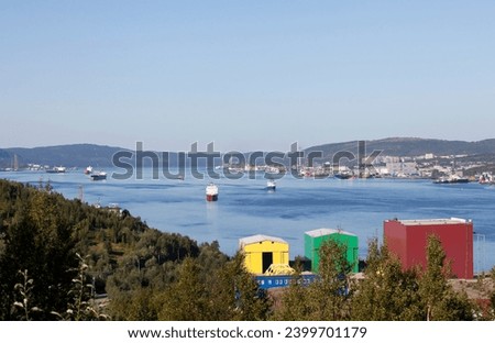 Panorama of the Kola Bay, seaport and city from the top of Cape Abram. Murmansk. Russia
